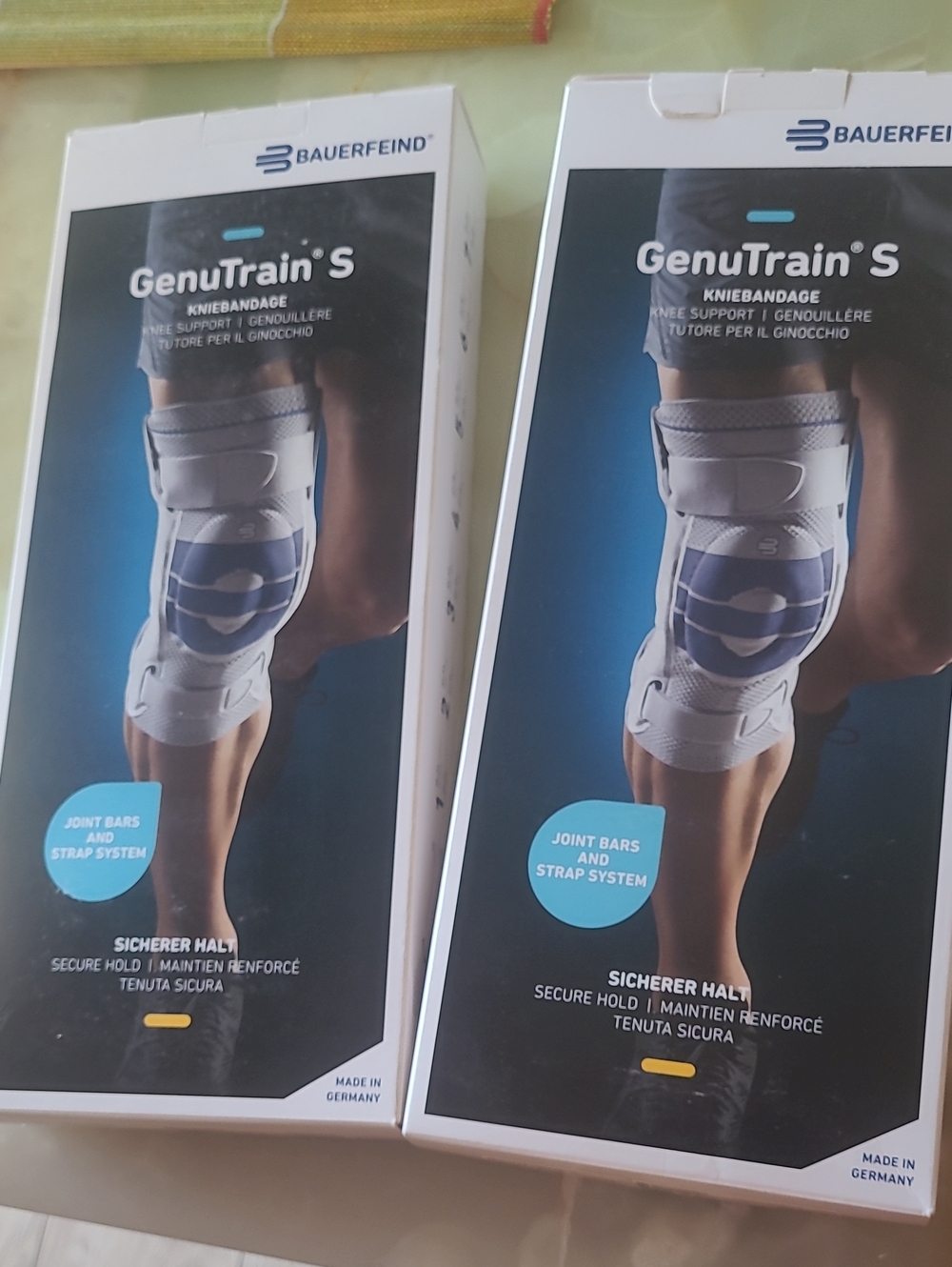 Bauerfeind GenuTrain S Knee Support - White with Blue Accents. Sells For $390/1